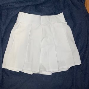 White pleated tennis skirt
